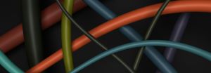 Close up of criss-crossing colour cables.